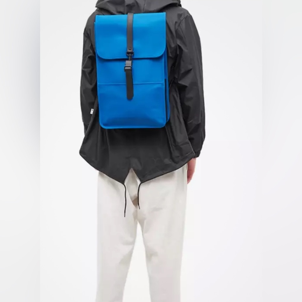 NEW RAINS Backpack Rucksack Waterproof Blue Wave W3. Fits Up To 15” Devices.